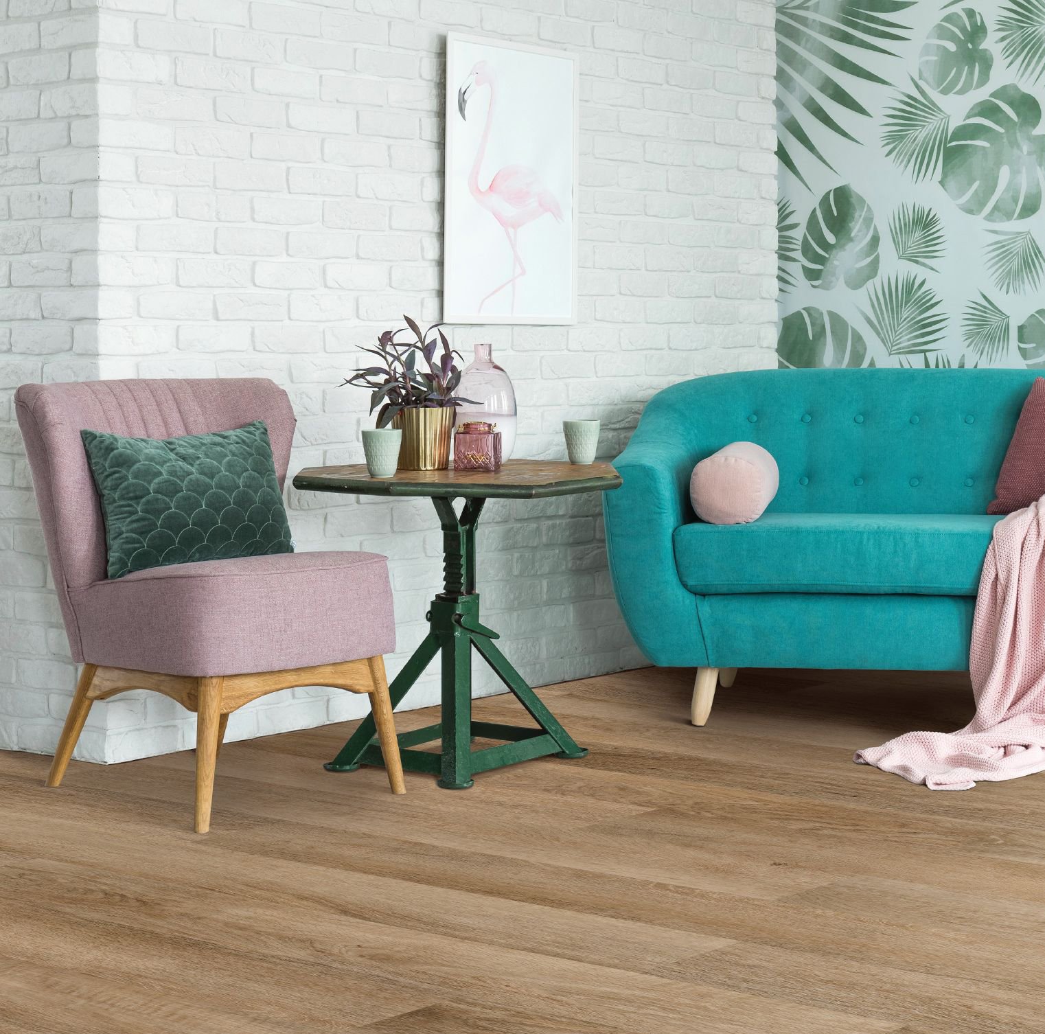 pink arm chair and teal couch on vinyl floor - Essex Paint and Carpet